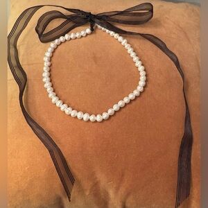 Elegant Pearl Necklace with Black Ribbon